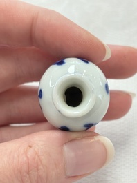 Ten Chinese blue and white miniature vases with figural and floral design, Kangxi