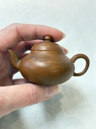 A small Chinese Yixing stoneware covered teapot and two Swatow Yixing-style covered teapots, Yixing Hui Mengchen 宜興惠孟臣製 and Shunji 順記 marks, 19/20th C