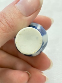 Ten Chinese blue and white miniature vases with figural and floral design, Kangxi