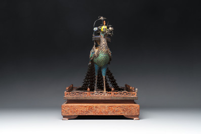 A large Chinese precious stone-inset and enamelled gilt-silver filigree peacock and flower basket on a wooden stand, Republic