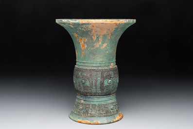 A Chinese archaic bronze wine vessel with taotie design, 'zun 尊', Western Zhou