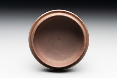 A Chinese Yixing stoneware 'squirrels among grape vines' teapot and cover, Kangxi
