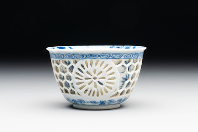 A Chinese blue and white reticulated double-walled cup, ruyi mark, Kangxi