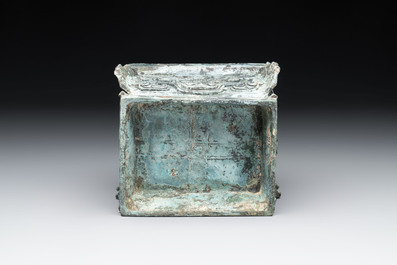A Chinese archaic bronze inscribed wine vessel with buffalo design, 'fangyi 方彝', Western Zhou