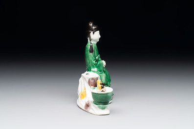 A Chinese verte biscuit 'scholar' brush rest, Kangxi