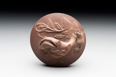 A Chinese Yixing stoneware 'squirrels among grape vines' teapot and cover, Kangxi