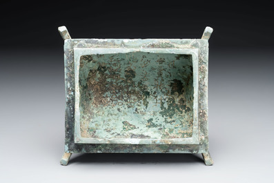 A Chinese archaic bronze inscribed wine vessel with buffalo design, 'fangyi 方彝', Western Zhou
