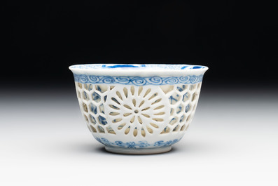 A Chinese blue and white reticulated double-walled cup, ruyi mark, Kangxi