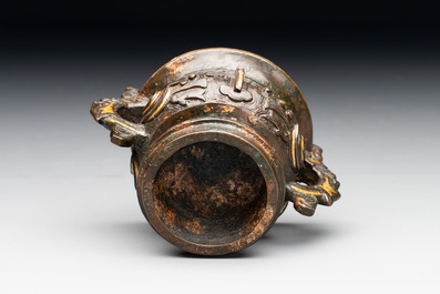 A Chinese archaistic gold and silver-inlaid bronze miniature censer, Ming
