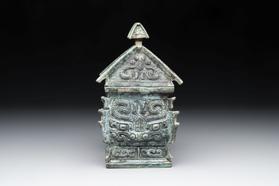 A Chinese archaic bronze inscribed wine vessel with buffalo design, 'fangyi 方彝', Western Zhou