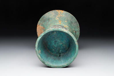 A Chinese archaic bronze wine vessel with taotie design, 'zun 尊', Western Zhou