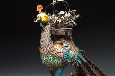 A large Chinese precious stone-inset and enamelled gilt-silver filigree peacock and flower basket on a wooden stand, Republic