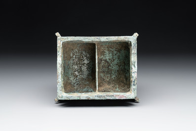 A Chinese archaic bronze inscribed wine vessel with buffalo design, 'fangyi 方彝', Western Zhou