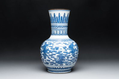 A Chinese blue and white copper-mounted 'cranes among clouds' vase, 18th C.