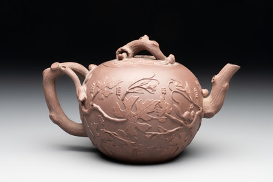A Chinese Yixing stoneware 'squirrels among grape vines' teapot and cover, Kangxi
