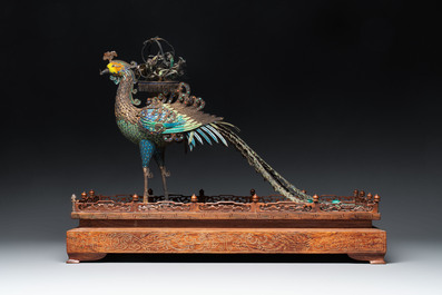 A large Chinese precious stone-inset and enamelled gilt-silver filigree peacock and flower basket on a wooden stand, Republic
