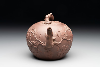 A Chinese Yixing stoneware 'squirrels among grape vines' teapot and cover, Kangxi