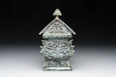 A Chinese archaic bronze inscribed wine vessel with buffalo design, 'fangyi 方彝', Western Zhou