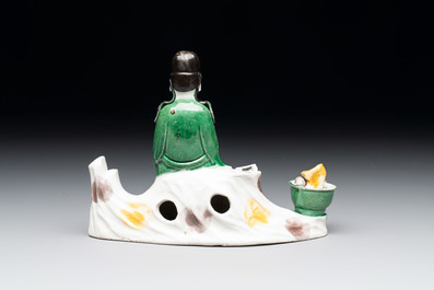 A Chinese verte biscuit 'scholar' brush rest, Kangxi