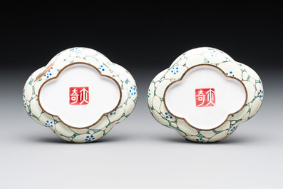 A pair of Chinese Canton enamel quadrifoil 'riverscape' saucers, Yi Qi 亦奇 mark, 18th C.