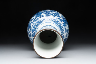 A Chinese blue and white copper-mounted 'cranes among clouds' vase, 18th C.