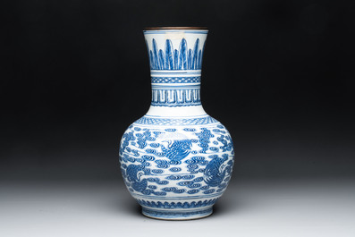 A Chinese blue and white copper-mounted 'cranes among clouds' vase, 18th C.