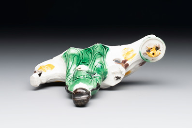 A Chinese verte biscuit 'scholar' brush rest, Kangxi