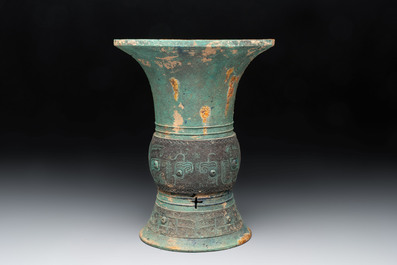 A Chinese archaic bronze wine vessel with taotie design, 'zun 尊', Western Zhou