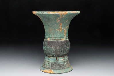 A Chinese archaic bronze wine vessel with taotie design, 'zun 尊', Western Zhou