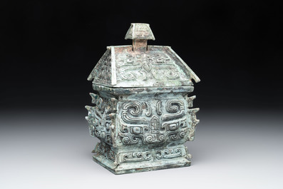 A Chinese archaic bronze inscribed wine vessel with buffalo design, 'fangyi 方彝', Western Zhou