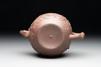 A Chinese Yixing stoneware 'squirrels among grape vines' teapot and cover, Kangxi
