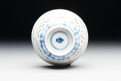 A Chinese blue and white reticulated double-walled cup, ruyi mark, Kangxi