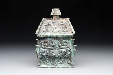 A Chinese archaic bronze inscribed wine vessel with buffalo design, 'fangyi 方彝', Western Zhou
