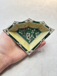 A Chinese verte biscuit 12-piece 'plum blossoms' sweetmeat set in a case, Kangxi