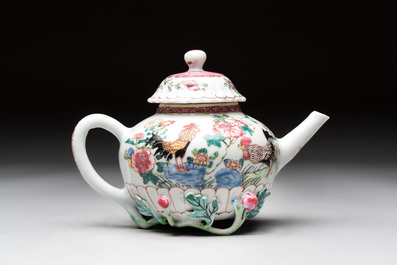 A Chinese famille rose 'roosters' covered teapot and two cups and saucers, Yongzheng