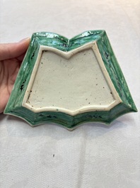 A Chinese verte biscuit 12-piece 'plum blossoms' sweetmeat set in a case, Kangxi