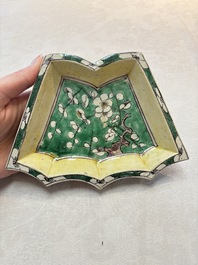 A Chinese verte biscuit 12-piece 'plum blossoms' sweetmeat set in a case, Kangxi