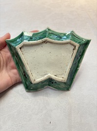 A Chinese verte biscuit 12-piece 'plum blossoms' sweetmeat set in a case, Kangxi