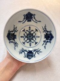 A pair of Chinese famille rose ruby-sgraffito-ground 'antiquities' bowls, Daoguang mark, 19/20th C.