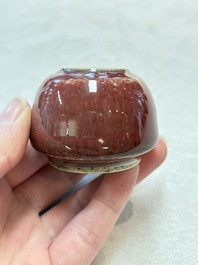 Three Chinese copper-red-glazed water pots, Kangxi mark, 19th C.