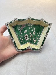 A Chinese verte biscuit 12-piece 'plum blossoms' sweetmeat set in a case, Kangxi