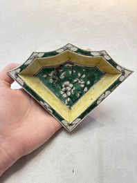 A Chinese verte biscuit 12-piece 'plum blossoms' sweetmeat set in a case, Kangxi
