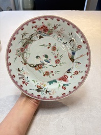 Three Chinese famille rose plates with birds among flowers and a grisaille plate, Yongzheng/Qianlong