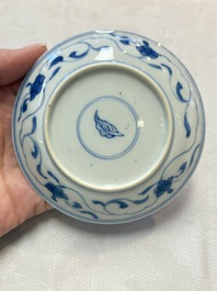 A set of four Chinese blue and white 'Sense of Smell' cups and saucers, artemisia leaf mark, Kangxi