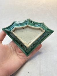 A Chinese verte biscuit 12-piece 'plum blossoms' sweetmeat set in a case, Kangxi