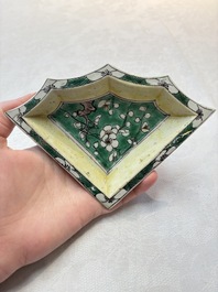 A Chinese verte biscuit 12-piece 'plum blossoms' sweetmeat set in a case, Kangxi