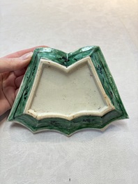 A Chinese verte biscuit 12-piece 'plum blossoms' sweetmeat set in a case, Kangxi