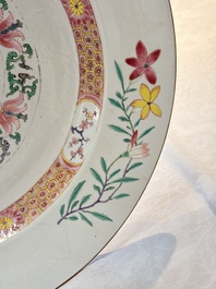 A large Chinese famille rose armorial dish with the arms of Campbell for the English market, Yongzheng/Qianlong