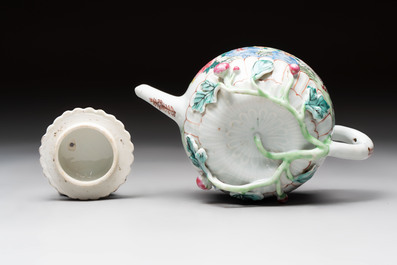 A Chinese famille rose 'roosters' covered teapot and two cups and saucers, Yongzheng