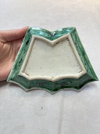 A Chinese verte biscuit 12-piece 'plum blossoms' sweetmeat set in a case, Kangxi